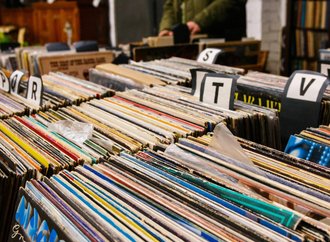 Vinyl records in bins at a record show